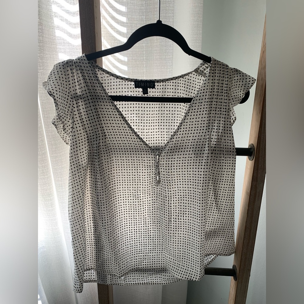 White polka dot blouse